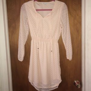 Cream long sleeve dress.
